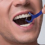 Floss: cleaning between teeth